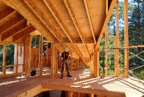 The roof framing rose; people passing slowed to look; sorrow waited round the corner; it will yet prevail.